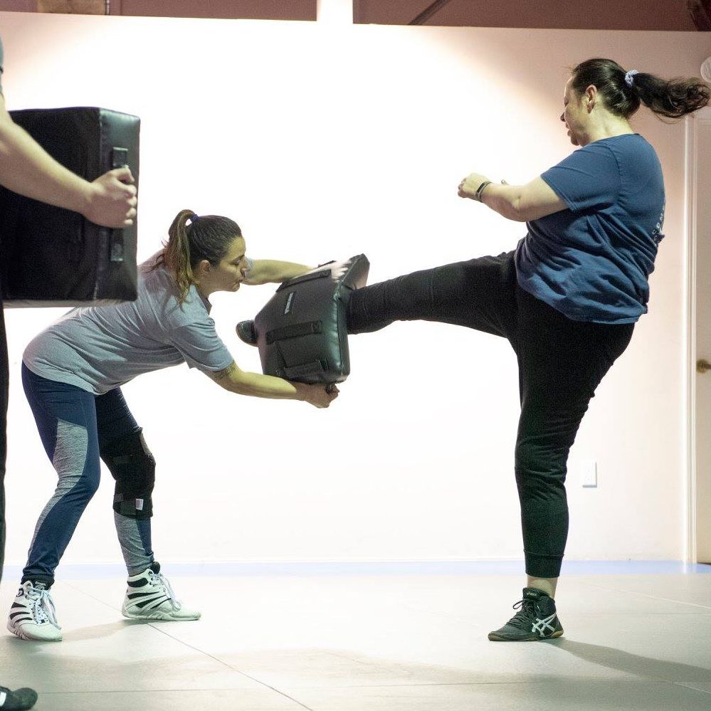 2 empower kickboxing students in orlando